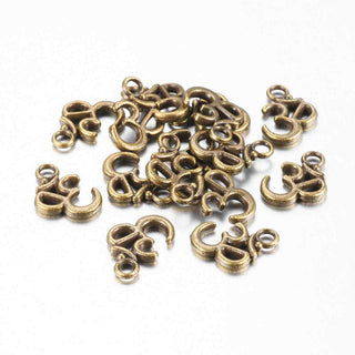 Dije Ohm/Aum Tono Bronce Envejecido 16x11x2mm | 9 uds