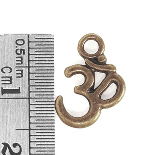 Dije Ohm/Aum Tono Bronce Envejecido 16x11x2mm | 9 uds
