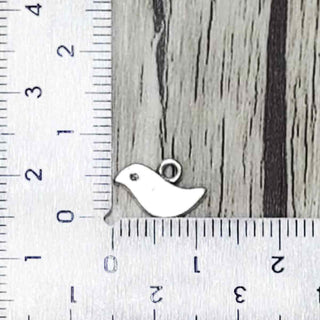 Dije Pajarito Estilo Tibetano Tono Plata Envejecida 7x11mm | Pack 20 uds