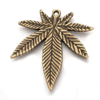 Dije Hoja de Cannabis Estilo Tibetano Tono Bronce Envejecido 39x33.5x2mm | 3 uds