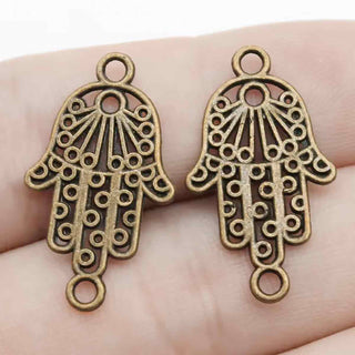Conector Mano de Fátima Hamsa Calada con Espirales y Rayos Estilo Tibetano Aleación Tono Bronce Envejecido 26x15x1mm | 8 uds