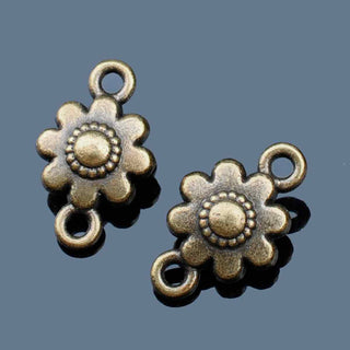 Conector Flor en Relieve con 8 Pétalos Redondeados y Botón Central Punteado Aleación Tono Bronce Envejecido 16x10mm | 5 uds