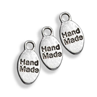 Dije Placa Ovalada "Hecho a Mano" Tono Plata Envejecida 15x8mm | 5 uds