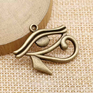 Dije Ojo de Horus Estilo Tibetano Tono Bronce Envejecido 26x31x2mm | 2 uds