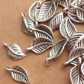 Dije Hoja de Árbol Estilo Tibetano Tono Plata Envejecida 14x7mm | 18 uds