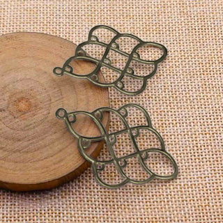 Enlaces, rombo grande, color bronce envejecido, tamaño 51x36x2mm.