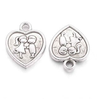 Dije Corazón con Pareja Estilo Tibetano Tono Plata Envejecida 16x13mm | 8 uds