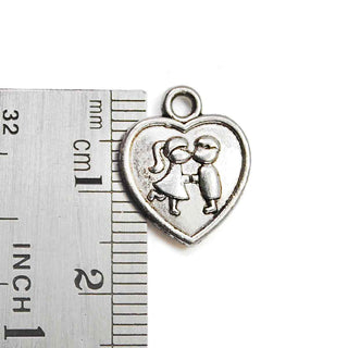 Dije Corazón con Pareja Estilo Tibetano Tono Plata Envejecida 16x13mm | 8 uds