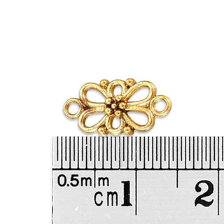 Enlace Flor 4 Pétalos con Bucles y Puntillado Tono Oro Envejecido 16x8x3.5mm | 12 uds