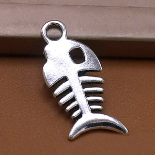 Dije Esqueleto de Pescado Estilo Tibetano Tono Plata Envejecida 18x7mm | 12 uds
