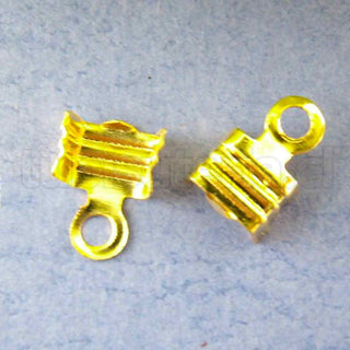 Tapa cinta pequeño o extremo de cordón de hierro, color oro, 7x4x3mm.