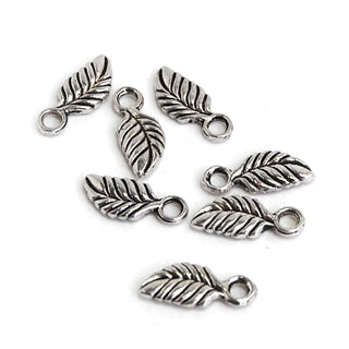Mini Dije Hoja Estilizada Estilo Tibetano Tono Plata Envejecida 14x6mm | 11 uds