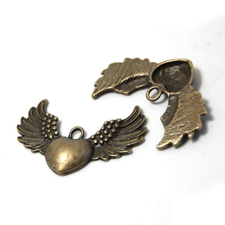 Dije Corazón con Alas Estilo Tibetano Tono Bronce Envejecido 25x36x4mm | 3 uds