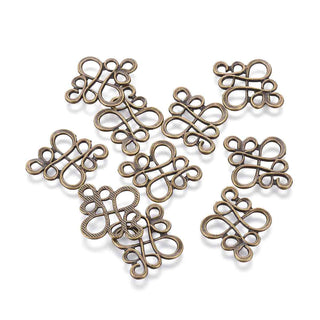 Dije Conector Nudo Chino Estilo Tibetano Tono Bronce Envejecido 22x18.5x1mm | 8 uds