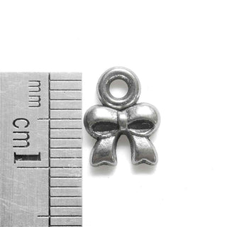 Mini Dije Lazo Encintado Estilo Tibetano Tono Plata Envejecida 8x8x2mm | 22 uds