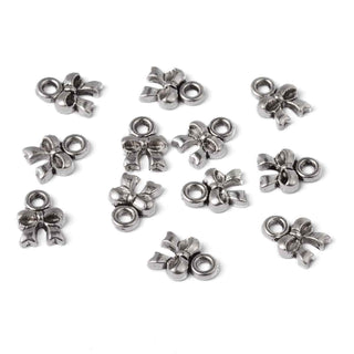 Mini Dije Lazo Encintado Estilo Tibetano Tono Plata Envejecida 8x8x2mm | 22 uds