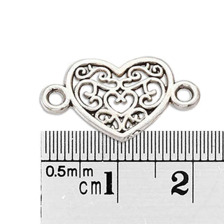 Enlaces de aleación, corazón calado, 12x21x1.5 mm.