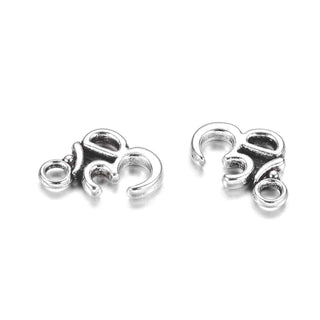 Dije Símbolo Om Lisa Estilo Tibetano Tono Plata Envejecida 16x11mm | 10 uds