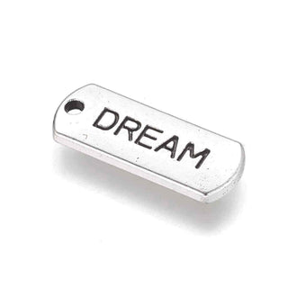 Dije Barra Rectangular con Inscripción Dream en Bajo Relieve Estilo Tibetano Tono Plata Envejecida 8x21mm | 7 uds