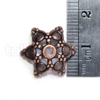 Tapas de cuentas en forma de flor de 15 mm de diámetro.