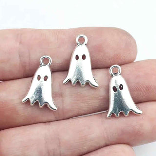 Dije Fantasma con Ojos Calados y Borde Ondulado Tono Plata Envejecida 20x13.5mm | 8 uds