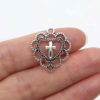 Dije Corazón con Cruz Estilo Tibetano Tono Plata Envejecida 21.5x20x3mm | 6 uds
