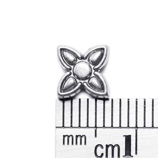 Cuentas espaciadoras de aleación, flor, 7×6.5×2.5 mm. 25 unidades.