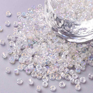 Mostacilla 8/0 color AB. cuentas de vidrio semi transparentes tornasol, disponibles en varios colores, 3 mm.