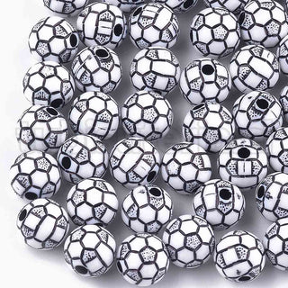 Pelotas de fútbol, abalorios o cuentas acrílicas color blanco y negro.