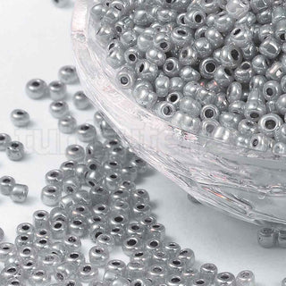 Mostacilla 8/0 ceilan, opciones de color para seleccionar, tamaño aproximado 3 mm de diámetro.