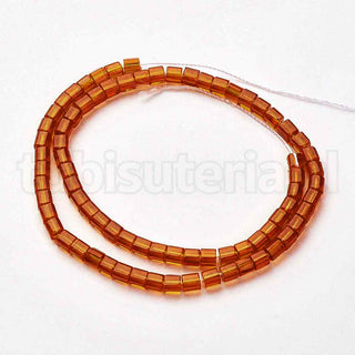 Abalorios de vidrio, cubos transparntes en varios tonos, 4 mm. aproximadamente 75 piezas/tira.