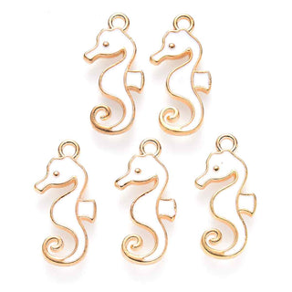 Colgantes de aleación esmaltado con diseño de caballito de mar, base color oro suave y 2 tonos para elegir. 21x11x2 mm.