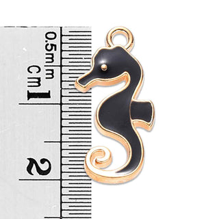 Colgantes de aleación esmaltado con diseño de caballito de mar, base color oro suave y 2 tonos para elegir. 21x11x2 mm.