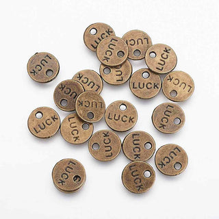 Dije Redondo Mensaje "Suerte" Tono Bronce Envejecido 9x1mm | 8 uds.