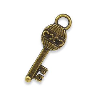 Dije Llave Estilo Tibetano de Aleación Tono Bronce Envejecido 26x8x1,5mm | 7 uds
