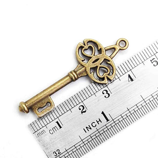 Maxi Dije Llave Estilo Tibetano de Aleación Tono Bronce Envejecido 43x18x2mm | 3 uds