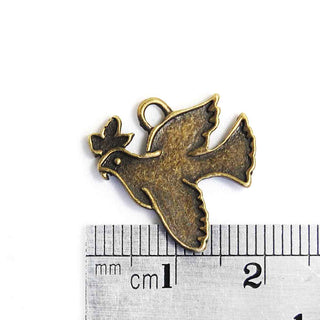 Dije Pájaro con Ramita de Olivo Estilo Tibetano de Aleación Tono Bronce Envejecido 19x18x2mm | 9 uds