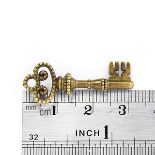 Dije Llave de Aleación Tono Bronce Envejecido 31x11x3mm | 4 uds