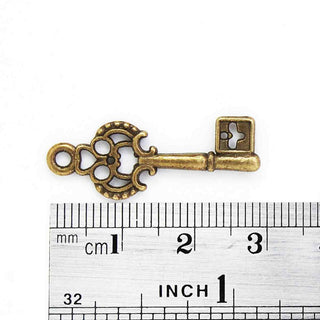 Dije Llave de Aleación Tono Bronce Envejecido 30x10x2,5mm | 7 uds