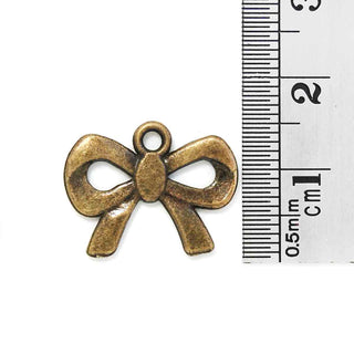 Dije Lazo de Cinta Estilo Tibetano Tono Bronce Envejecido 19x15x1mm | 5 uds.