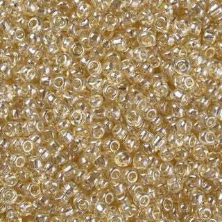 Mostacilla lustered 8/0. Abalorio de vidrio semi transparente con color brillante lustroso, varios tonos para seleccionar, 3 mm.