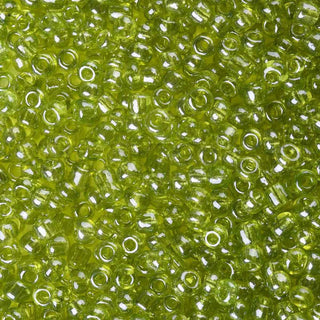 Mostacilla lustered 8/0. Abalorio de vidrio semi transparente con color brillante lustroso, varios tonos para seleccionar, 3 mm.