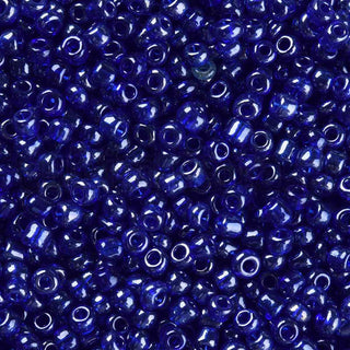 Mostacilla lustered 8/0. Abalorio de vidrio semi transparente con color brillante lustroso, varios tonos para seleccionar, 3 mm.