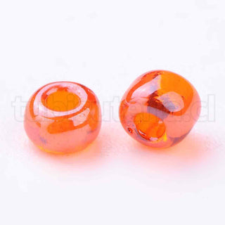 Mostacilla lustered 8/0. Abalorio de vidrio semi transparente con color brillante lustroso, varios tonos para seleccionar, 3 mm.