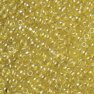 Mostacilla lustered 8/0. Abalorio de vidrio semi transparente con color brillante lustroso, varios tonos para seleccionar, 3 mm.