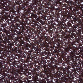Mostacilla lustered 8/0. Abalorio de vidrio semi transparente con color brillante lustroso, varios tonos para seleccionar, 3 mm.