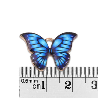 Colgantes de aleación en forma de mariposas rosadas esmaltadas.