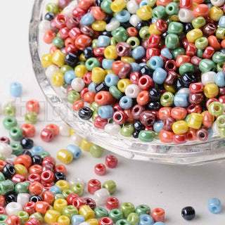 Mostacilla perlada 8/0. Abalorio de vidrio de 3 mm de diámetro., varios colores para seleccionar. 20 gramos.