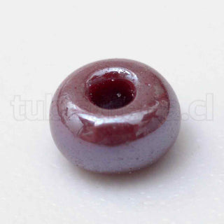 Mostacillón 6/0. Abalorio de vidrio color perlado, 4 mm de diámetro, orificio 1.2 mm. 20 gramos.