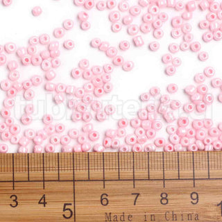 Mostacilla 8/0, color sólido, opciones de color para seleccionar, tamaño aproximado 3 mm de diámetro.